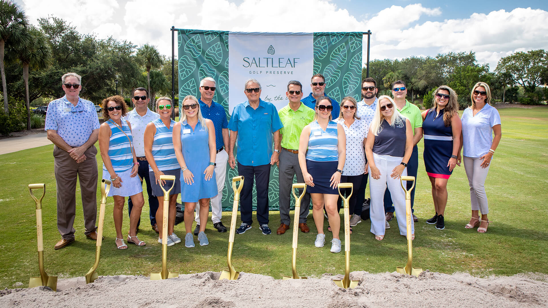 A group of people posing for a photo at the Saltleaf Golf Preserve in Bonita Springs.