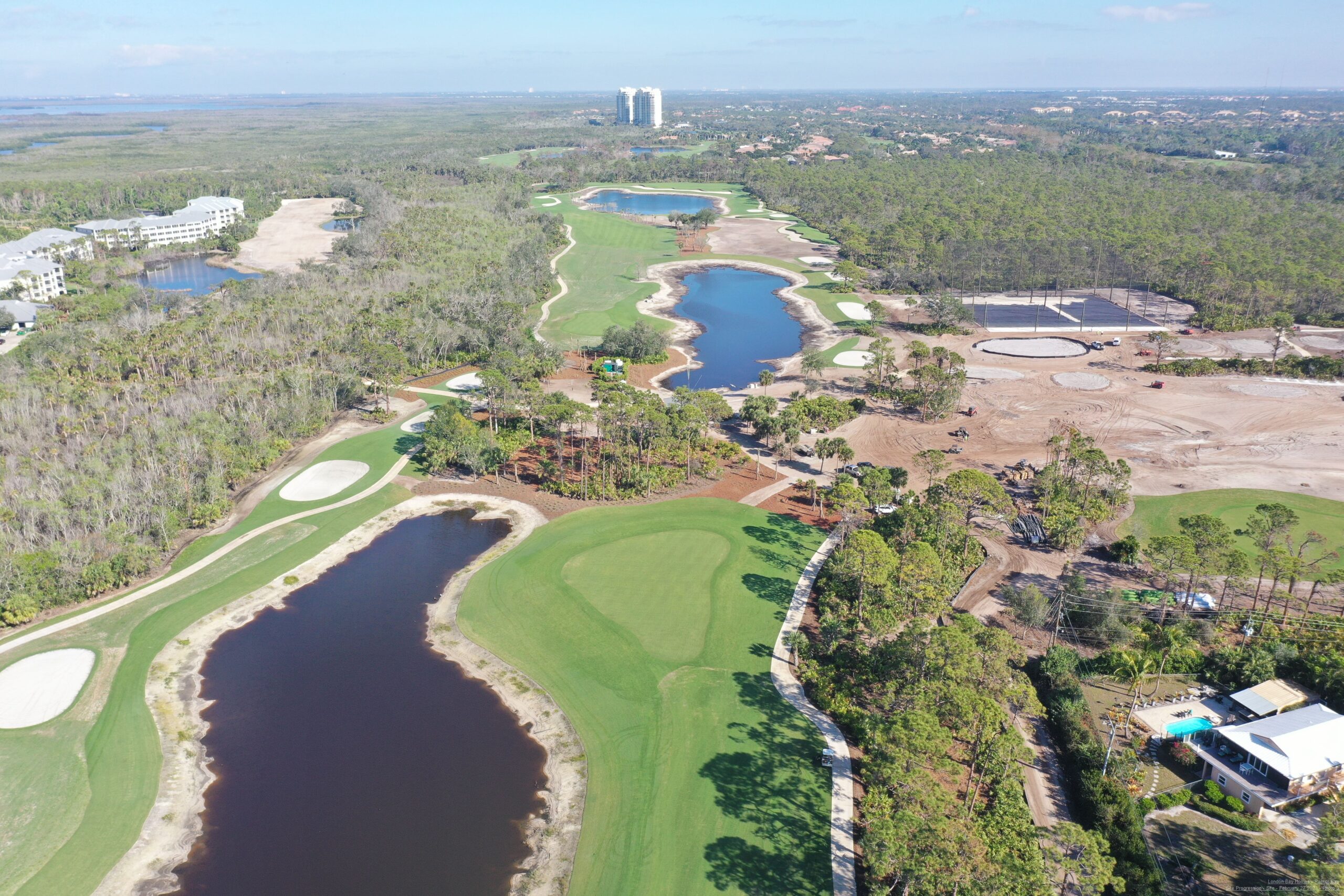 An aerial view of the championship golf course at Saltleaf Golf Preserve in Bonita Springs, with water featuring prominently.
