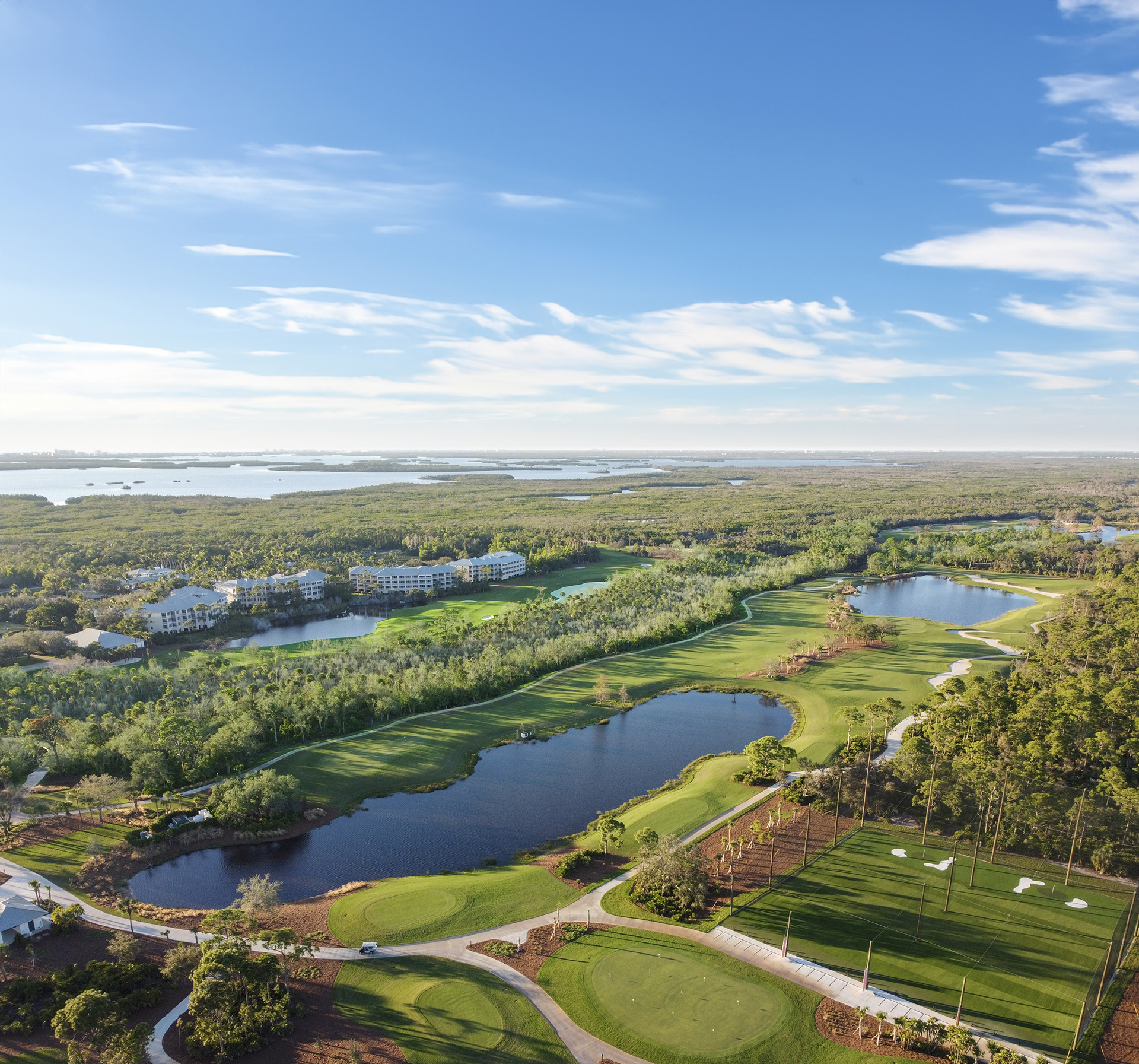 An aerial view of the championship Saltleaf Golf Preserve course in Bonita Springs, with water features throughout.