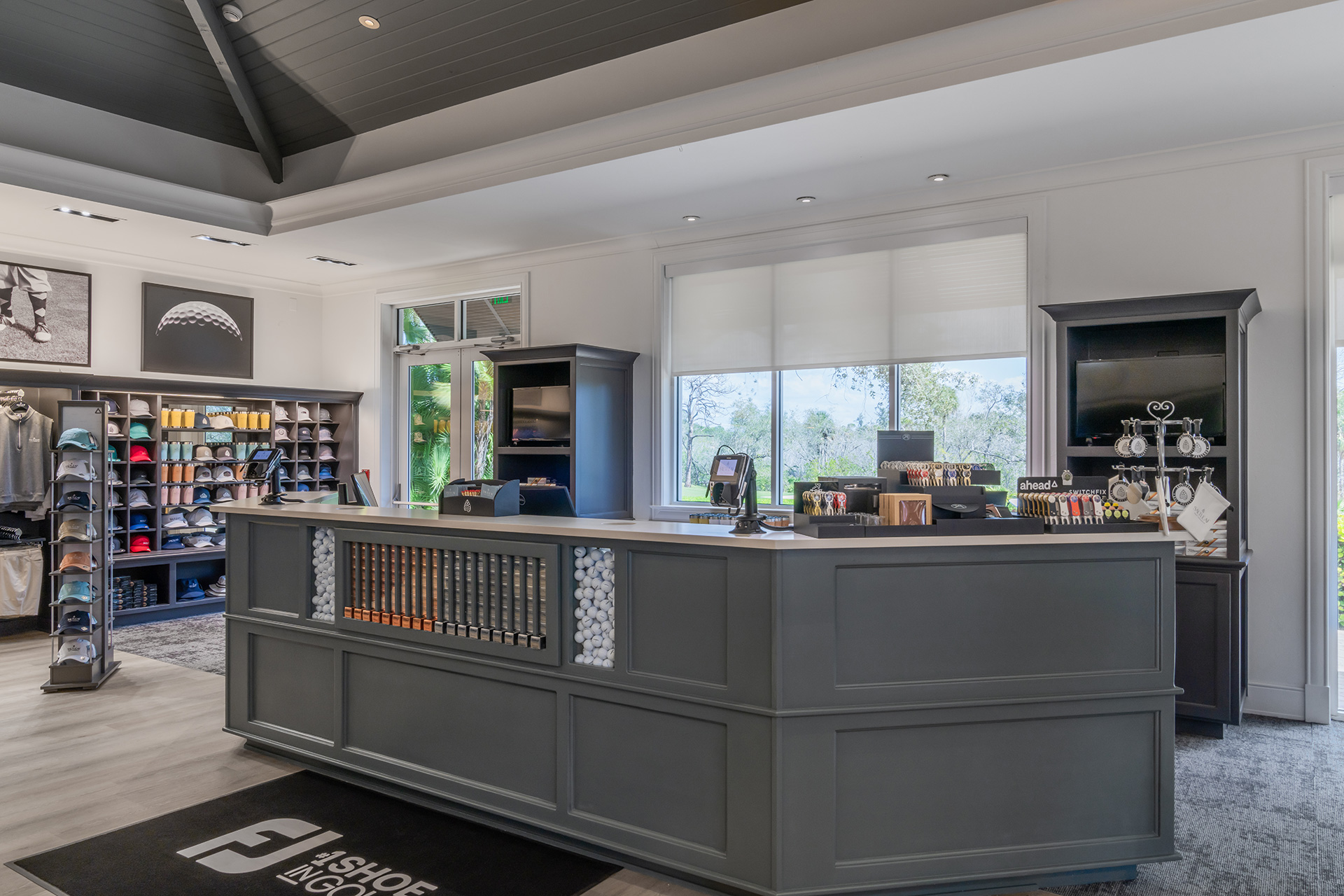 A golf shop located at the Saltleaf Golf Preserve in Bonita Springs, equipped with a counter and shelves.
