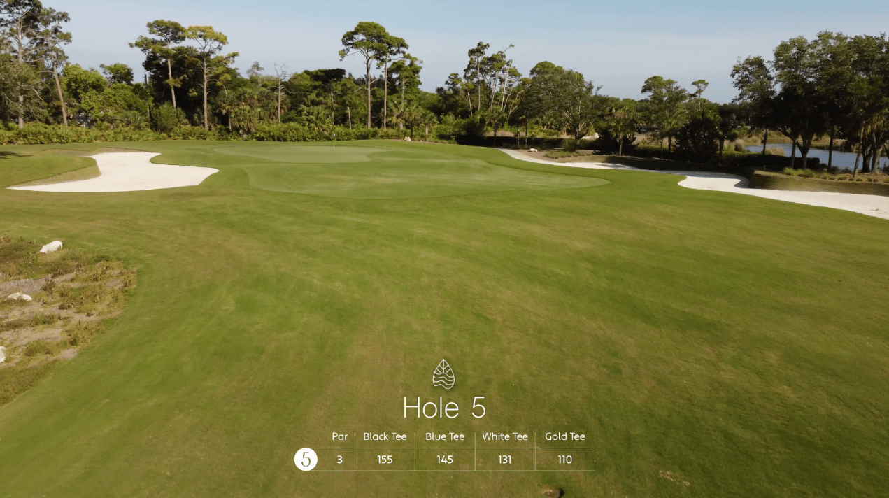 Aerial view of Hole 5 on a golf course, showing green, sand bunkers, trees, and distance information for each tee.